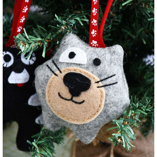 Wombat baby Christmas decorationCute baby wombat christmas decoration. This handmade wool felt softie from Tasmania will bring joy to any room. Add some Australia to your christmas tree.Tasmanian Softies