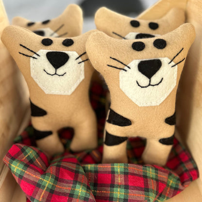 Tasmanian Tiger stuffed toy made from wool felt.Tasmanian Tiger plush toy . We secretly believe they are alive, hiding in the thick bush of Tasmania. Here is your very own Tassie Tiger soft toy. Made from wool felt.Tasmanian Softies