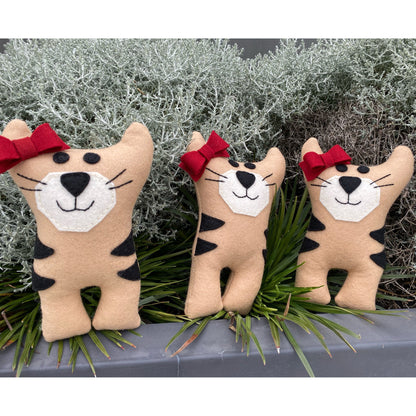 Tasmanian Tiger stuffed toy made from wool felt.Tasmanian Tiger plush toy . We secretly believe they are alive, hiding in the thick bush of Tasmania. Here is your very own Tassie Tiger soft toy. Made from wool felt.Tasmanian Softies