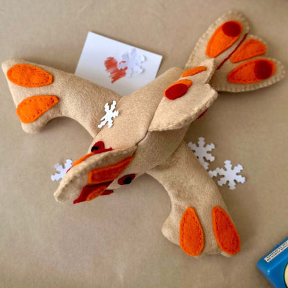 Handfish soft toy handmade in Felt made in TasmaniaThis Handfish plushie is skillfully handmade in Tasmania from wool felt. Its adorable design pays homage to the rare Handfish species and is filled with recycled plastic bottles, making it a fun and eco-c