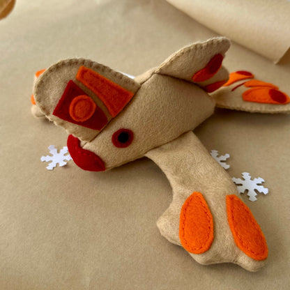 Handfish soft toy handmade in Felt made in TasmaniaThis Handfish plushie is skillfully handmade in Tasmania from wool felt. Its adorable design pays homage to the rare Handfish species and is filled with recycled plastic bottles, making it a fun and eco-c