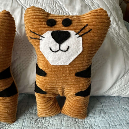 Tasmanian Tiger Corduroy soft toy"Go wild for this Tasmanian Tiger soft toy! Handmade, each one is embroidered with love. Made from cotton corduroy and stuffed with recycled plastic bottles.Tasmanian Softies