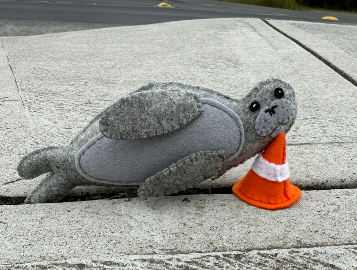 Neil the Seal soft toy with traffic cone made from wool feltNeil the Seal, a loveable Tasmanian character! This soft toy comes with his signature traffic cone, bringing a smile to anyone's face. Made from wool felt.Tasmanian Softies