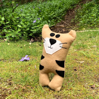 Tasmanian Tiger stuffed toy made from wool felt.Tasmanian Tiger plush toy . We secretly believe they are alive, hiding in the thick bush of Tasmania. Here is your very own Tassie Tiger soft toy. Made from wool felt.Tasmanian Softies